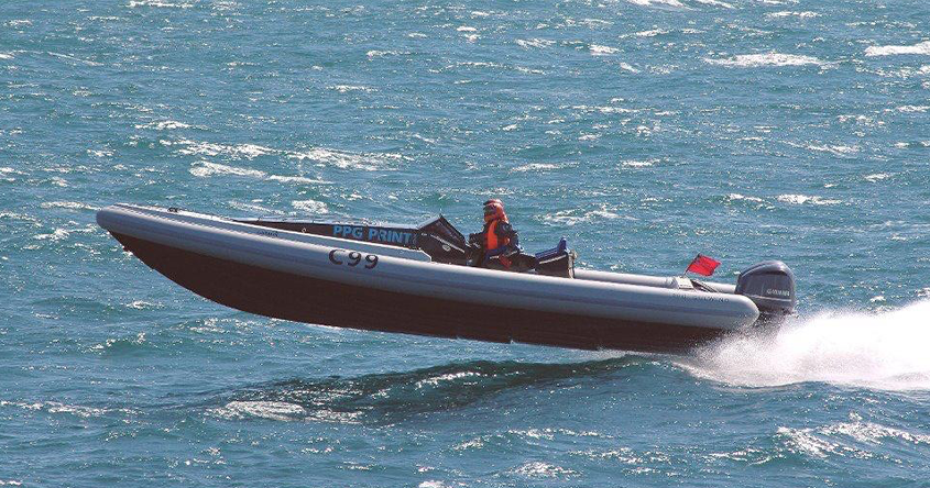 Older photograph of powerboat racing